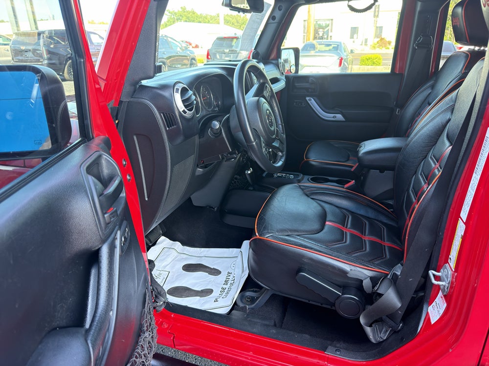 2014 Jeep Wrangler Unlimited Sahara — manufacturer image; actual vehicle may differ