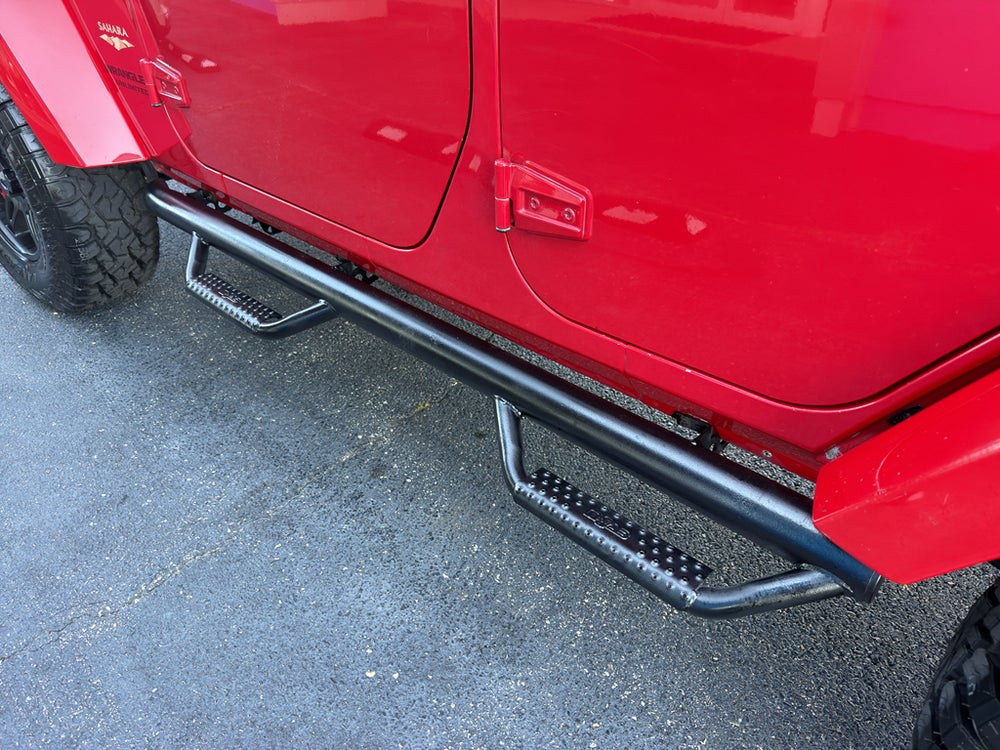2014 Jeep Wrangler Unlimited Sahara — manufacturer image; actual vehicle may differ