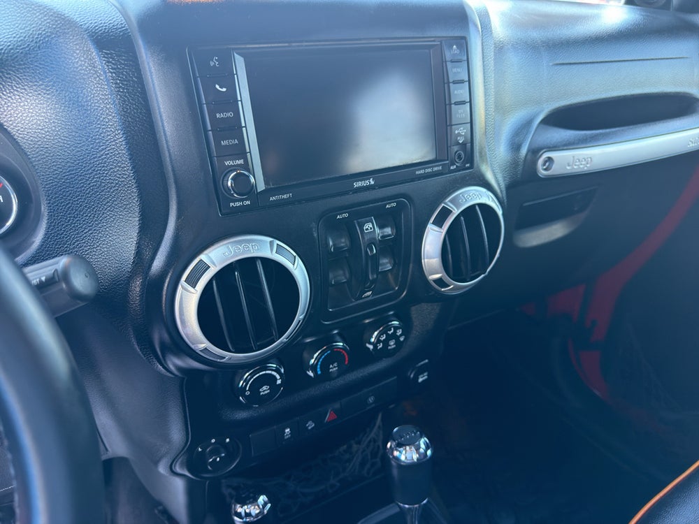 2014 Jeep Wrangler Unlimited Sahara — manufacturer image; actual vehicle may differ
