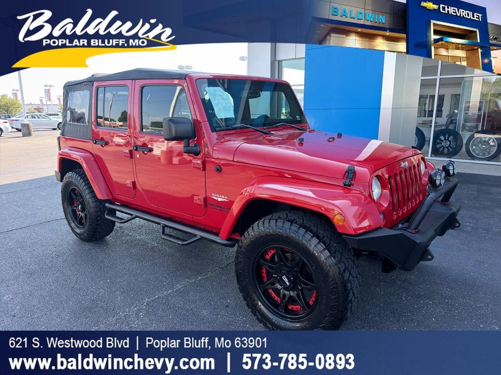2014 Jeep Wrangler Unlimited Sahara — manufacturer image; actual vehicle may differ