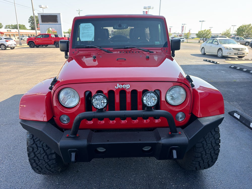2014 Jeep Wrangler Unlimited Sahara — manufacturer image; actual vehicle may differ
