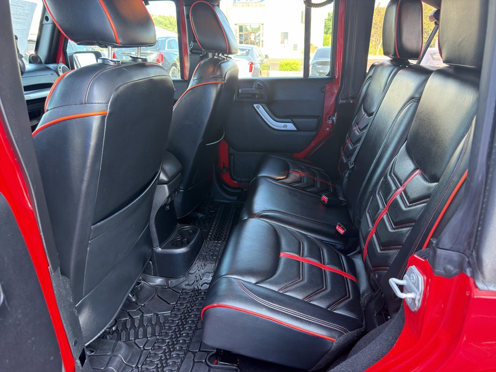 2014 Jeep Wrangler Unlimited Sahara — manufacturer image; actual vehicle may differ