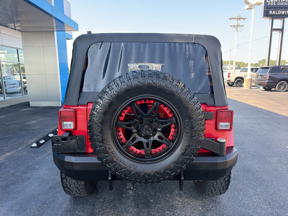 2014 Jeep Wrangler Unlimited Sahara — manufacturer image; actual vehicle may differ