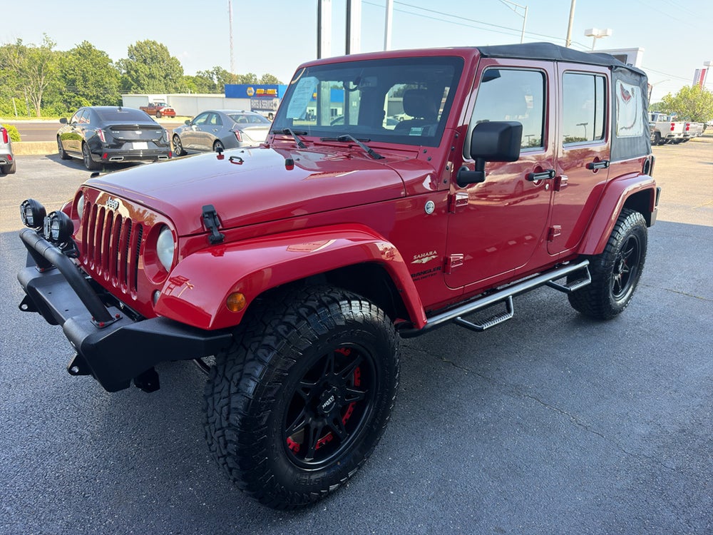 2014 Jeep Wrangler Unlimited Sahara — manufacturer image; actual vehicle may differ