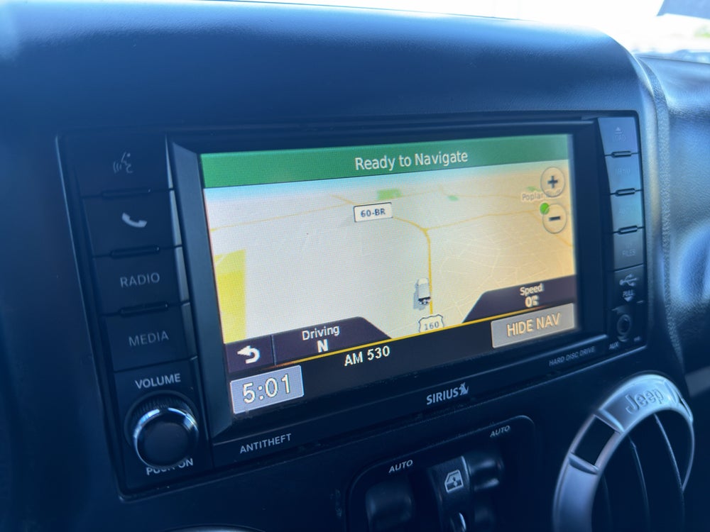 2014 Jeep Wrangler Unlimited Sahara — manufacturer image; actual vehicle may differ